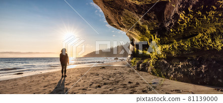 Adventurous Woman at Mystic Beach on the West Coast of Pacific Ocean 81139000