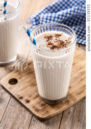 Fresh horchata with cinnamon in glass Fresh horchata with cinnamon in glass 81139355