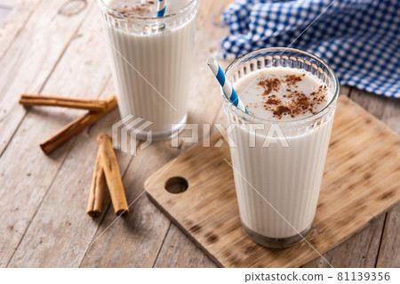 Fresh horchata with cinnamon in glass Fresh horchata with cinnamon in glass 81139356