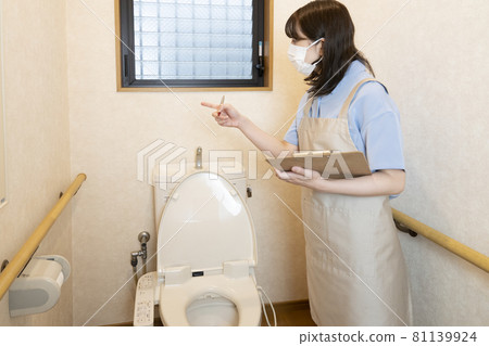 House cleaning woman checking after cleaning House cleaning woman checking after cleaning 81139924