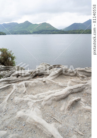 Keswick, English Lake District, U.K. 28 July, 2021. Beautiful view of the lake, beach and mountains. 81140558
