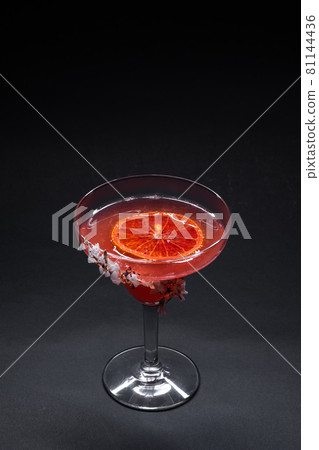 hemingway daiquiri cocktail drink with grapefruit in glass on black background hemingway daiquiri cocktail drink with grapefruit in glass on black background 81144436