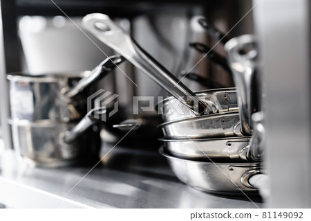 Kitchen utensils on work surface in professional kitchen 81149092