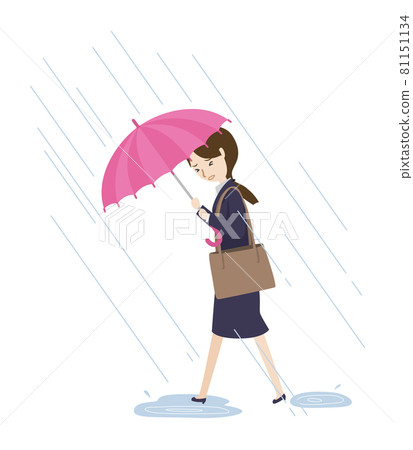 Female employee walking with an umbrella in heavy rain 81151134