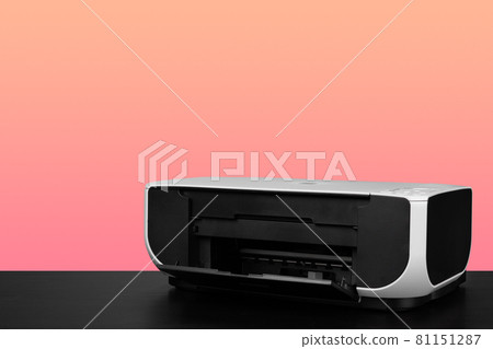 Compact home laser printer against pink background Compact home laser printer against pink background 81151287