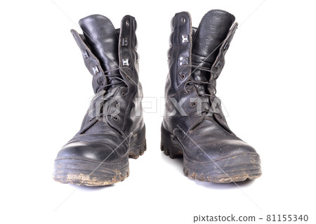 used dirty and dusty military black boots isolated on white back used dirty and dusty military black boots isolated on white back 81155340