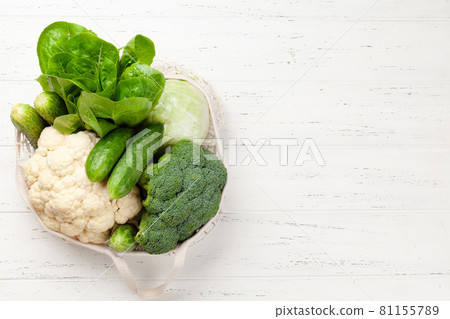 Eco friendly mesh shopping bag with fresh vegetables Eco friendly mesh shopping bag with fresh vegetables 81155789