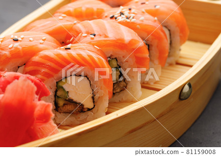 Philadelphia sushi roll on plate close up Philadelphia sushi roll on plate close up 81159008