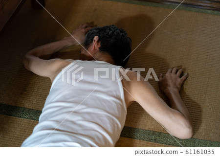 Senior man sleeping prone Senior man sleeping prone 81161035