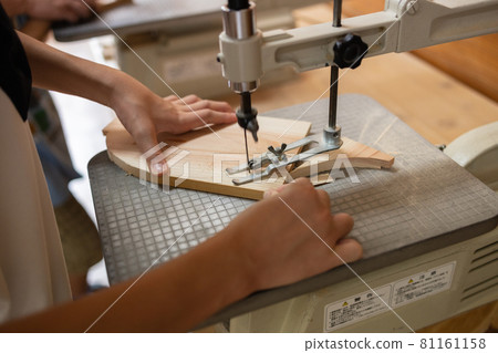 Hands of elementary school boys who enjoy woodworking Hands of elementary school boys who enjoy woodworking 81161158