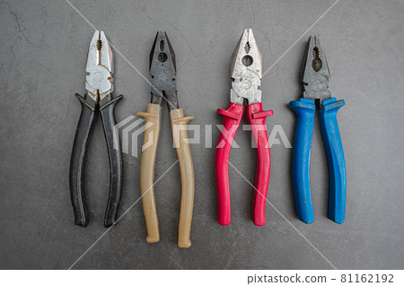 Old set of pliers of different sizes and calibers for home renovations Old set of pliers of different sizes and calibers for home renovations 81162192