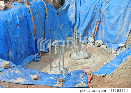 JOHOR, MALAYSIA -JUNE 28, 2016: Excavated and cut to level bore pile at the construction site. Ready to construct pile cap reinforcement bar as next step of work.  81163534