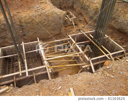 JOHOR, MALAYSIA -APRIL 10, 2015: Pile cap form work with reinforcement bar in it at the construction site in Johor, Malaysia.  81163620