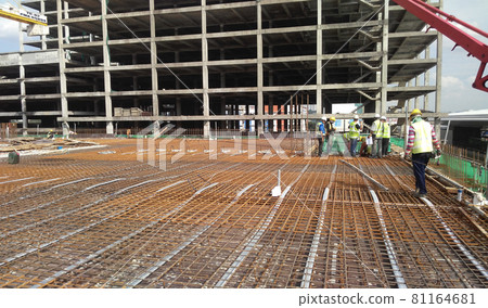 SELANGOR, MALAYSIA -MAY 13, 2016: Floor slab reinforcement bar at the construction site. It use to strengthen the concrete. It is shaped follow the engineer design. 81164681