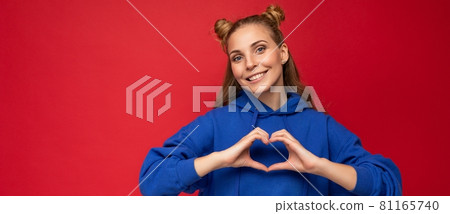 Panoramic photo of young happy positive attractive blonde woman with two horns with sincere emotions 81165740