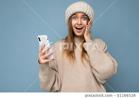 Photo of attractive crazy amazed surprised young woman wearing casual stylish clothes standing Photo of attractive crazy amazed surprised young woman wearing casual stylish clothes standing 81166526