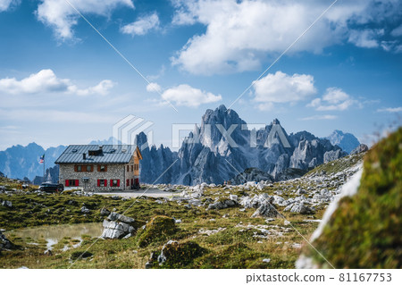 Rifugio Lavaredo with Cadini di Misurina mountain group in background. Dolomites at the Cime di Lavaredo, Italy Rifugio Lavaredo with Cadini di Misurina mountain group in background. Dolomites at the Cime di Lavaredo, Italy 81167753
