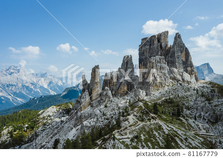 Aerial view of Cinque Torri in Dolomites mountains in Italy. Epic landscape on a sunny day of summer Aerial view of Cinque Torri in Dolomites mountains in Italy. Epic landscape on a sunny day of summer 81167779