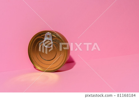 Canned food tin on pink studio background 81168184