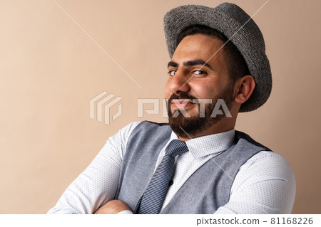 Close up portrait of young arab man in studio 81168226