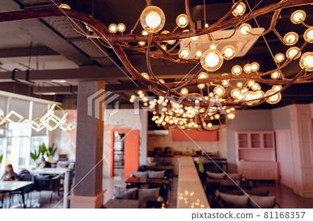 Empty cafe or restaurant interior at a daytime Empty cafe or restaurant interior at a daytime 81168357