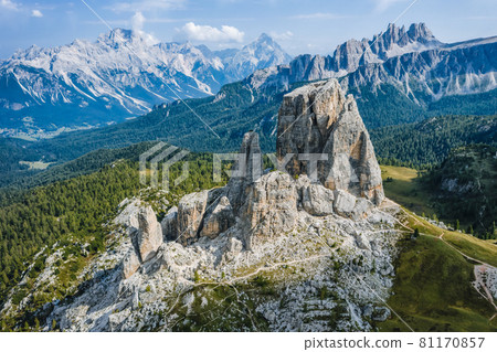 Aerial view of Cinque Torri in Dolomites mountains in Italy. Epic landscape on a sunny day of summer Aerial view of Cinque Torri in Dolomites mountains in Italy. Epic landscape on a sunny day of summer 81170857