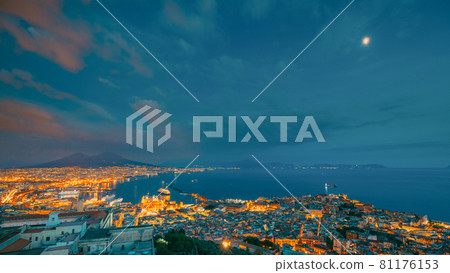 Naples, Italy. Skyline Cityscape In Evening Lighting. Tyrrhenian Sea And Landscape With Volcano Mount Vesuvius. City In Night Illuminations 81176153