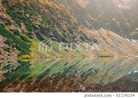 Tatra National Park, Poland. Calm Lake Czarny Staw under Rysy And Summer Mountains Landscape. Beautiful Nature, Scenic View Of Five Lakes Valley. UNESCO World Heritage Site 81176154
