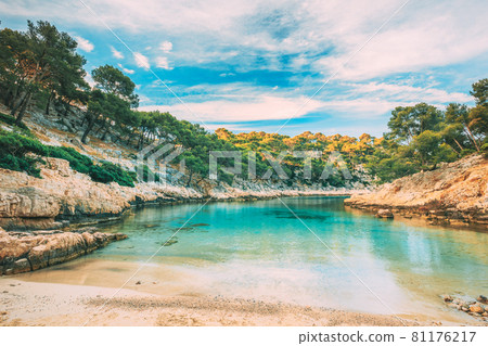 Calanques, Cote de Azur, France. Beautiful nature of Calanques on the azure coast of France. Calanques - a deep bay surrounded by high cliffs. Landscape in sunrise light during Sunny summer morning 81176217