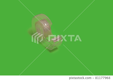 sellotape dispenser isolated on a green background. office accessories 81177968