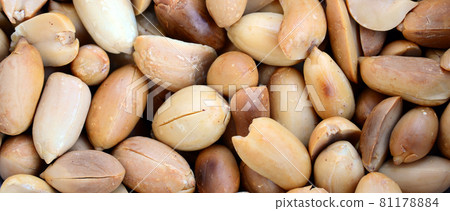 Peanut. A lot of small yellow nuts without peel. Background texture Peanut. A lot of small yellow nuts without peel. Background texture 81178884