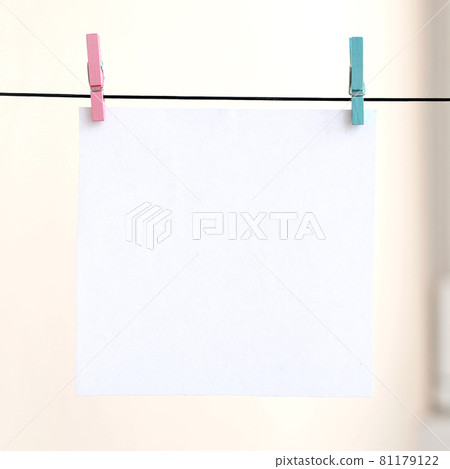 White blank cards on rope, light wall background. Creative reminder, small sheets of paper on old clothespin, memo backdrop White blank cards on rope, light wall background. Creative reminder, small sheets of paper on old clothespin, memo backdrop 81179122