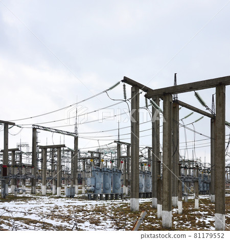 Power plant is a station of transformation. A lot of cables, poles and wires, transformers. Electro-energy. 81179552