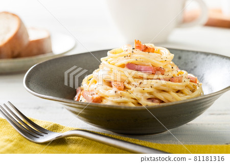 Rich carbonara with cheese, cream and eggs Rich carbonara with cheese, cream and eggs 81181316