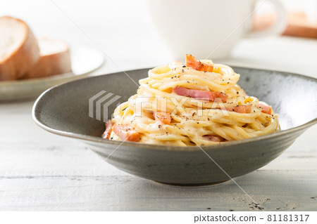 Rich carbonara with cheese, cream and eggs Rich carbonara with cheese, cream and eggs 81181317
