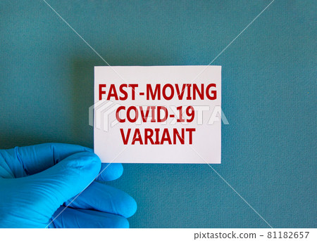 British fast-moving variant covid-19 symbol. Hand in blue glove with white card. Concept words 'fast-moving covid-19 variant'. Medical and COVID-19 pandemic fast-moving variant concept. Copy space. 81182657