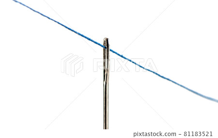 Stretched blue thread through the eye of a needle over a white background. Stretched blue thread through the eye of a needle over a white background. 81183521