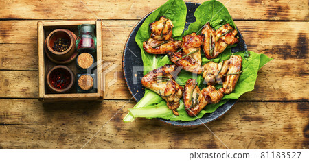 Fried chicken wings in teriyaki sauce 81183527