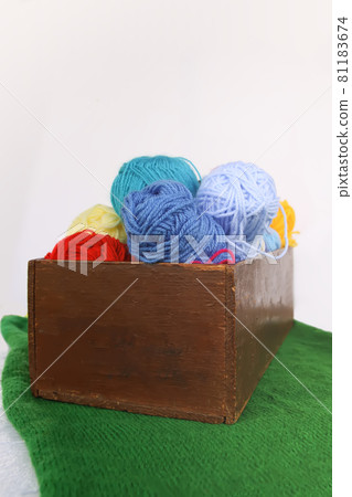 Bright colorful balls of yarn on white background. Bright colorful balls of yarn on white background. 81183674