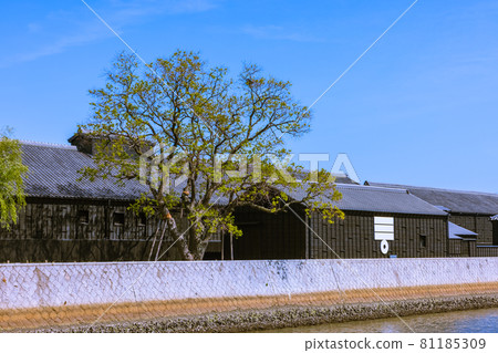 Handa City, Aichi Prefecture, a town of solder warehouses along the Handa Canal in the afternoon 81185309