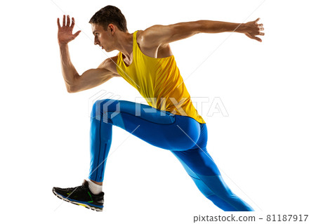 Portrait of professional male athlete, runner training isolated on white studio background. Muscular, sportive man. Concept of action, motion, youth, healthy lifestyle. Portrait of professional male athlete, runner training isolated on white studio background. Muscular, sportive man. Concept of action, motion, youth, healthy lifestyle. 81187917