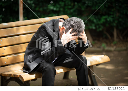 Businessmen worried outdoors Businessmen worried outdoors 81188021