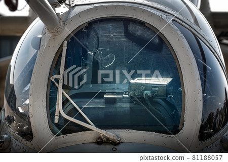 Front view close-up of military helicopter cockpit Front view close-up of military helicopter cockpit 81188057