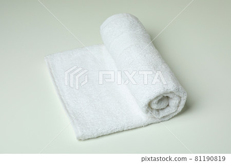 Clean rolled towel on white background, close up Clean rolled towel on white background, close up 81190819