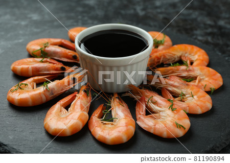 Tray with shrimps and soy sauce, close up 81190894