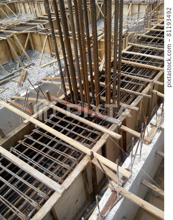 PERAK, MALAYSIA -JUNE 30, 2016: Construction workers fabricating timber form work mostly using timber and plywood at the construction site.   81193492