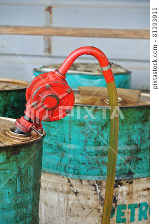 SELANGOR, MALAYSIA -AUGUST 26, 2016: Hand operated oil pump at the diesel storage area.  SELANGOR, MALAYSIA -AUGUST 26, 2016: Hand operated oil pump at the diesel storage area.  81193911