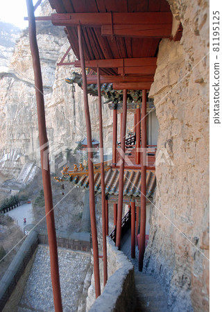 The Hanging Temple or Hanging Monastery near Datong in Shanxi Province, China. View from within the temple showing the support struts. The Hanging Temple is a major tourist sight near Datong. 81195125