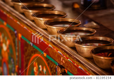 Tibetan Water Offering Bowls in Likir gompa Tibetan Buddhist monastery. Ladakh, India Tibetan Water Offering Bowls in Likir gompa Tibetan Buddhist monastery. Ladakh, India 81195154