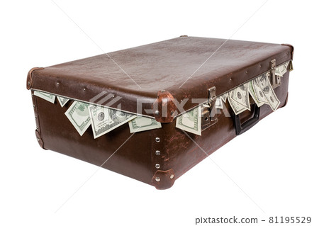 A brown suitcase with sticking out dollar banknotesold. Closed, laying on side and isolated on white background. 81195529